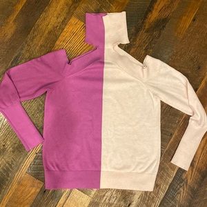 525 America Turtle Neck Sweater with cut out shoulders . Purple and pale pink .